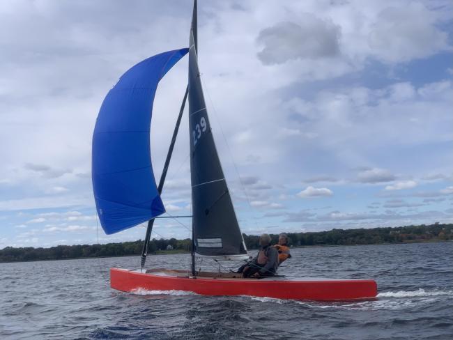 International 110 project boats, in water, undersail, port side view