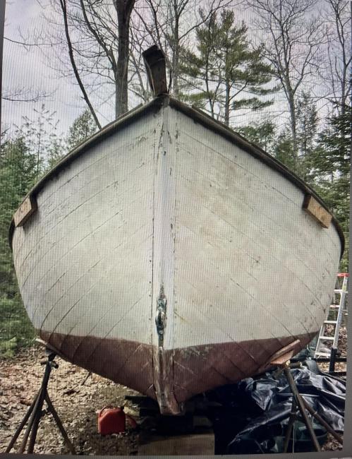  JOHN ALDEN DESIGNED CATBOAT , on the hard, bow view