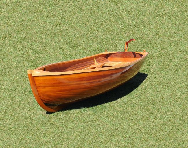 Little Bear Wooden Dinghy 10', on grass port side view
