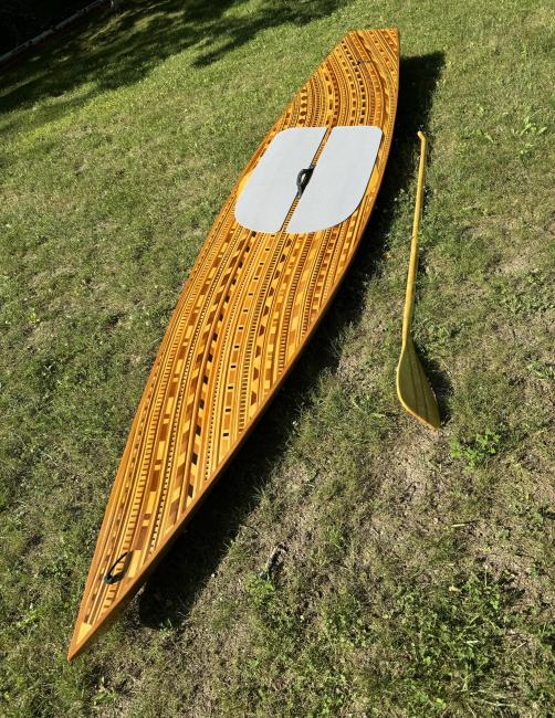 Amazing Paddleboard laying on ground