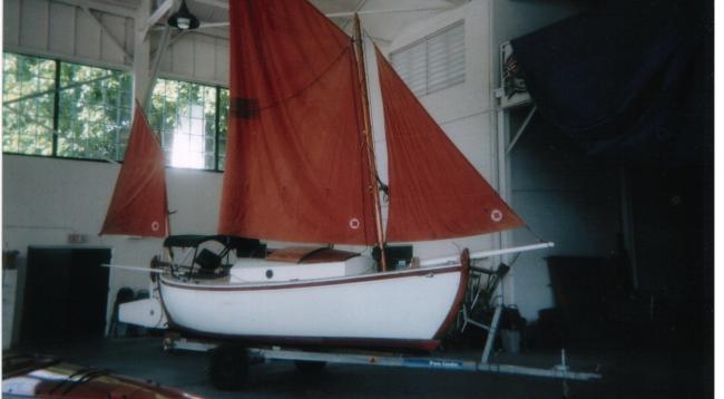 Orbus, a Steve Redmond Elver, sails up, starboard side view