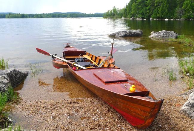 Thames River Skiff, beached and water