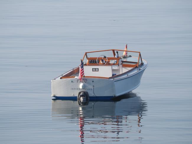 One of a Kind Runabout , in water stern view