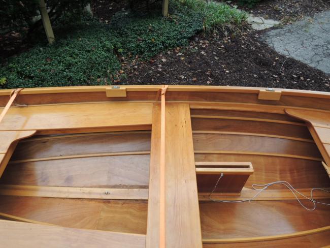 Penobscot 13 wooden sailboat, sidde view upclose inside