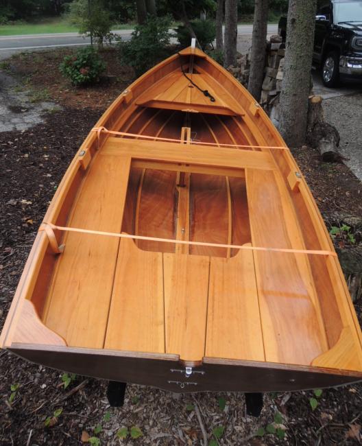 Penobscot 13 wooden sailboat, stern view looking down towards the bow