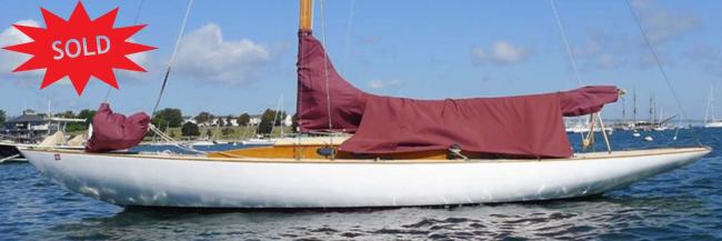 SOLD Quincy Adams Day Sailer, in water port side view