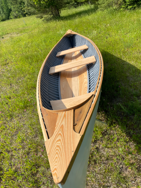 14 Foot Rushton Wooden Canoe, on the lawn