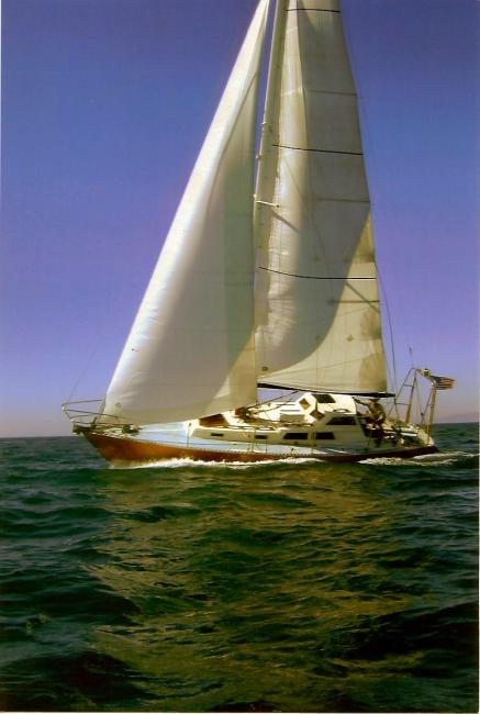 "SHADOWFOX" 31' Ocean crossing cruiser, undersail port side view