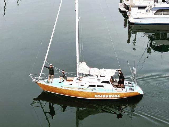 "SHADOWFOX" 31' Ocean crossing cruiser, in water, sails down, view from above, port side and deck view
