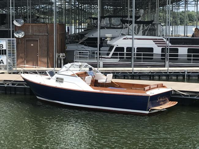 1968/2018 CHRIS-CRAFT CAVALIER CUTLASS 27, docked in water port side view