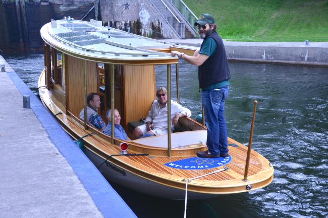 Sparks 30' electric/solar/diesel , docked on starboard side, view from bow end