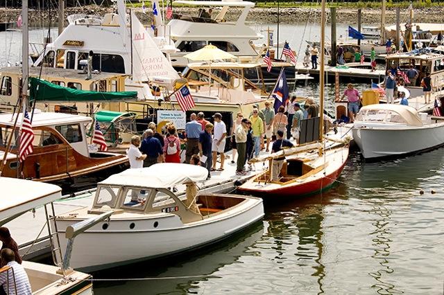 Custom-built boats docked for visitors to board at the Maine Boats, Homes & Harbors Show.