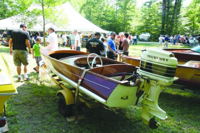 Vintage boats and lake and boating memorabilia are auctioned