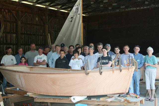Family boat builders. Photo courtesy https://seagrant.unh.edu/family-boat-building.