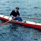Simon Watts rowing Petaluma shell
