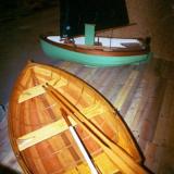 Glued lapstrake plywood (sail version), traditional lapstrake (rowing version).