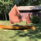 "Piccolo" 12' 8" Sailing Canoe and Model, on the grass, sails up