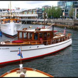 1929 44'  bridge deck cruiser, in water port side view