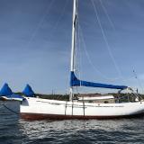 1990 Lyle Hess Cutter, in water on mooring starboard side view 1