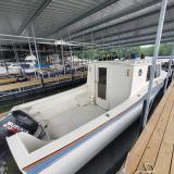 2008 27' custom cruiser, docked starboard side view