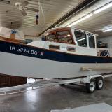 2013 PACIFIC COAST FISHING DORY on trailer inside port side view