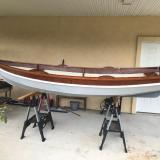 SHELLBACK SAILING DINGHY, on stands inside, port side view