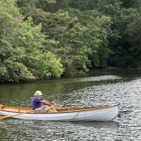 GORGEOUS 15' WHITEHALL STYLE ROWBOAT, in water starboard side view