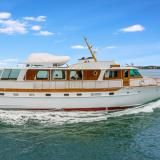 Great Wooden Boats Available for Sale & Lease, powerboat underway starboard side view
