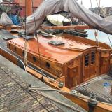 GROOTE BEER, classic flat bottomed Dutch Botteryacht, docked port side view of deck