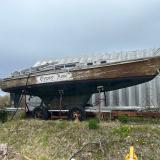 1964 Marconi-rigged 37' Wooden Sailboat, full long view, on the hard view of starboard side