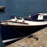 2025 Paul Gartside Custom 17' Electric Launch, in water port side view