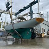 41' K Aage Nielsen sloop 324-A BUTTERFLY, suspended on lift full keel view stern port side