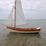 14' Amesbury Skiff, in water port side view