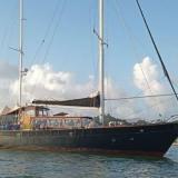 66' 1966 Custom 66 For Sale, in water starboard side bow view