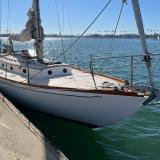 "MERRYWING" A 39' sloop, starboard side bow view, docked