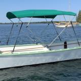 19' Hylan Big Ben Garvey (2012), in water starboard side view