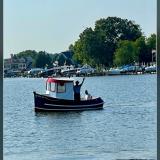 14' Candu-EZ Mini Tug by Berkeley Engineering., underway port side view
