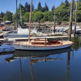 Ed Monk Sloop, docked port side view