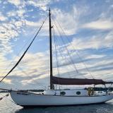 Modified Wianno Senior Sailboat, Hull #1, moored port side view