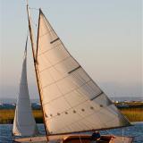 TULIP, gaff rigged centerboard knockabout sloop under sail in Bluefish River, Duxbury, MA, USA